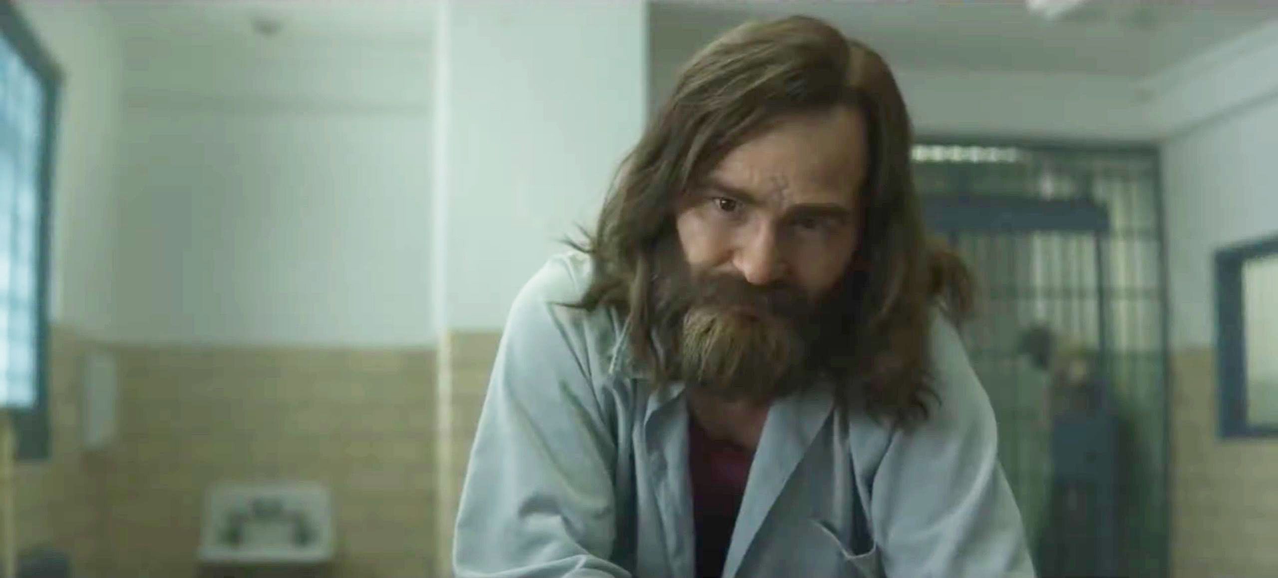How Damon Herriman Locked Down TWO Portrayals Of Charles Manson