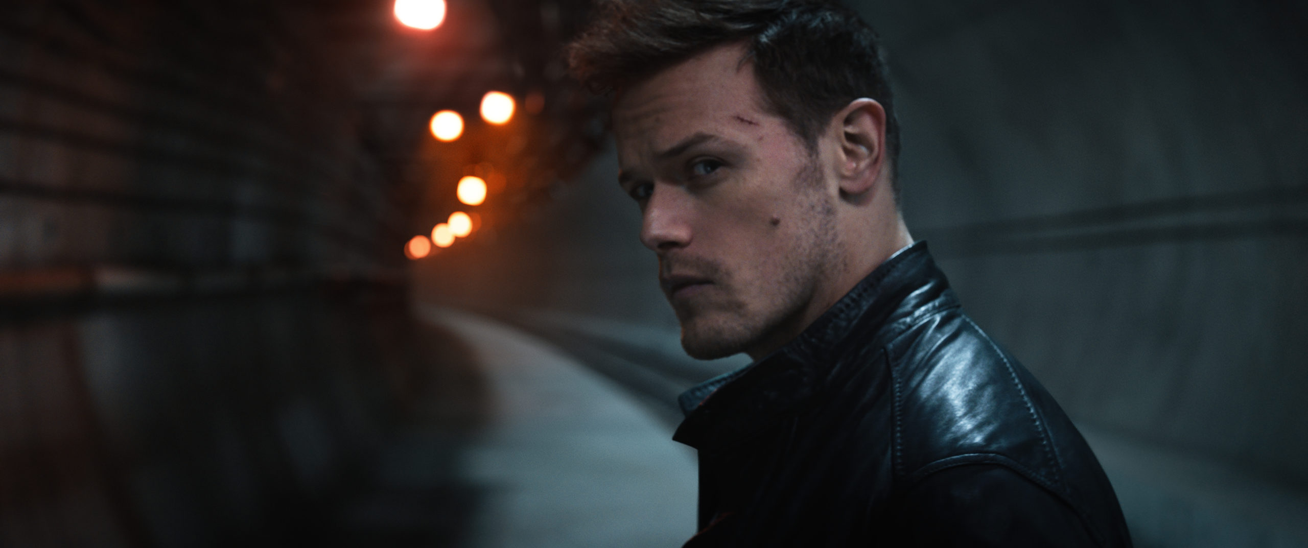 Sam Heughan Plays A Different King Of Psychopath In SAS: Red Notice [Exclusive Interview]