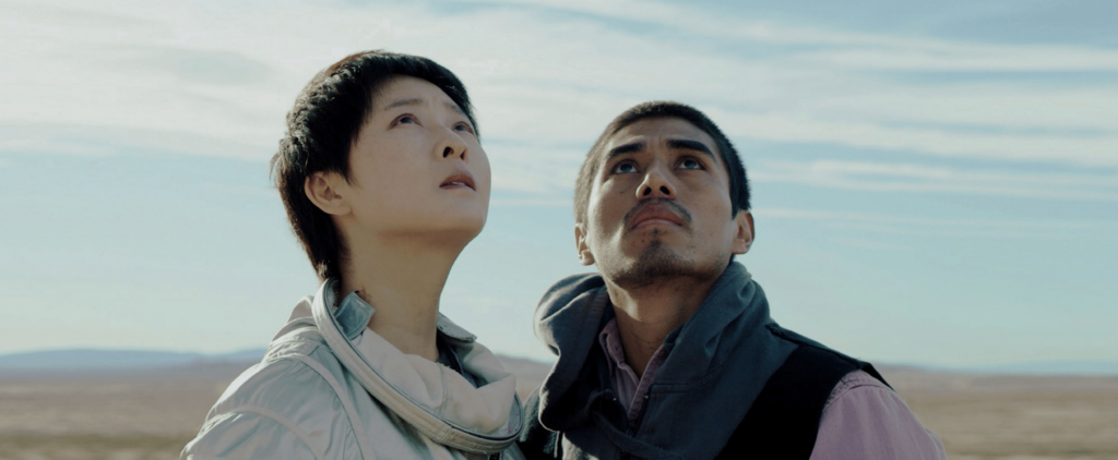 Jorge Antonio Guerrero and Xingchen Lyu in We Are Living Things