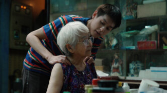 Putthipong Assaratanakul and Usha Seamkhum in How to Make Millions Before Grandma Dies